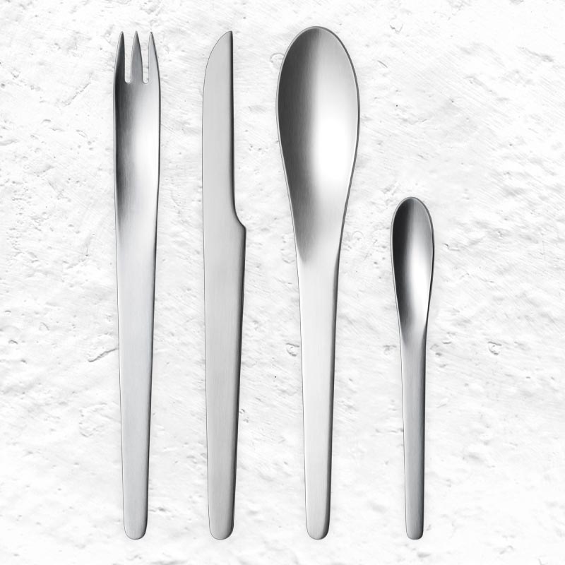 Cutlery Set des. Arne Jacobsen, 1957 for Georg Jensen - 24 pieces (6x knives, forks, small & large spoons)