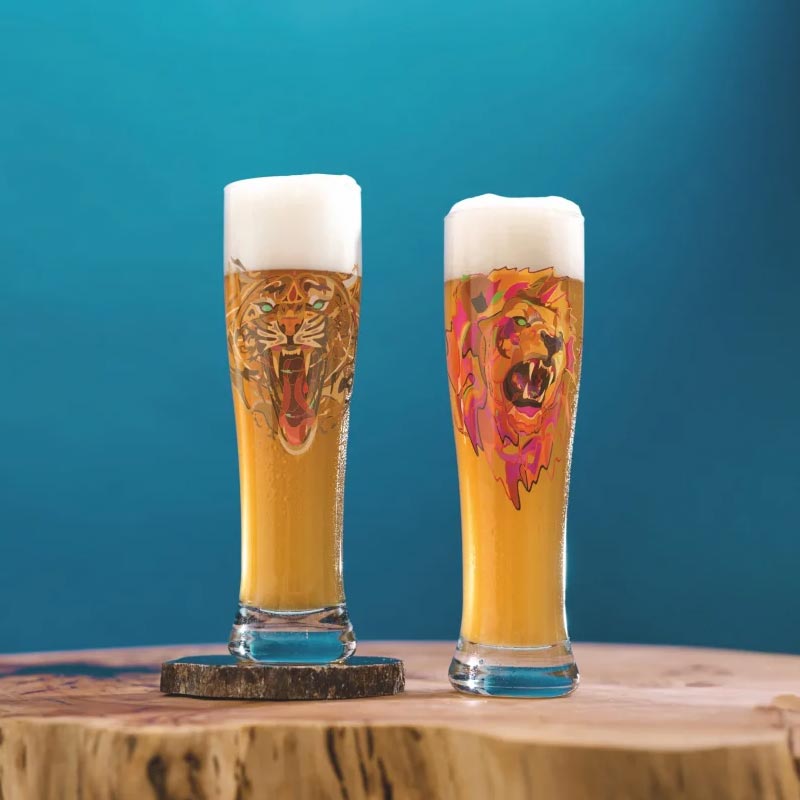 Brauchzeit Weizen set featuring Lion and Tiger illustrations - des. Justin Maller for Ritzenhoff