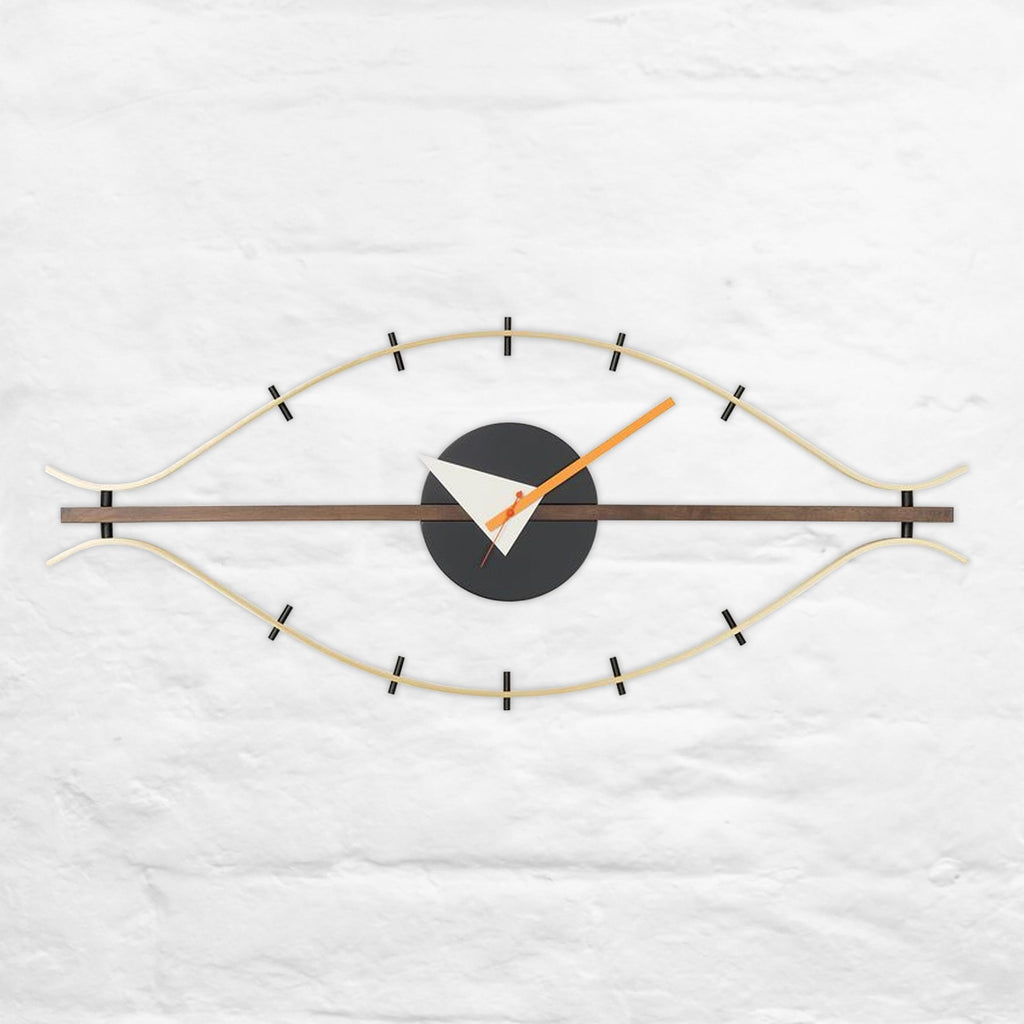Eye Clock - brass / walnut - des. George Nelson, 1948-60 (made by Vitra)