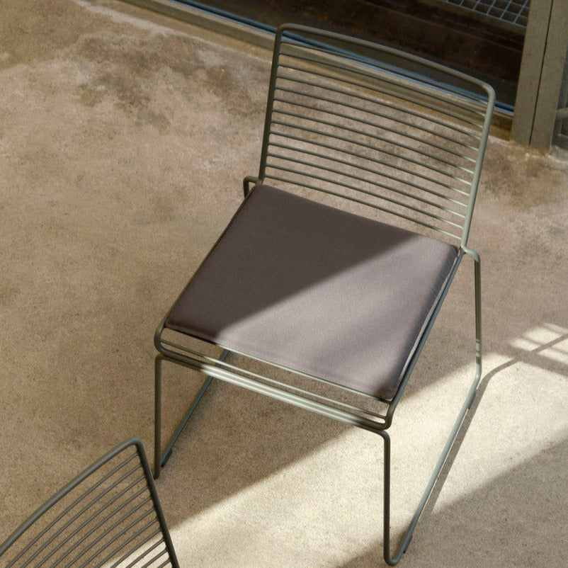Hee Dining Chair - sled base, standard glider, fall green powder coated steel - des. Hee Welling for HAY