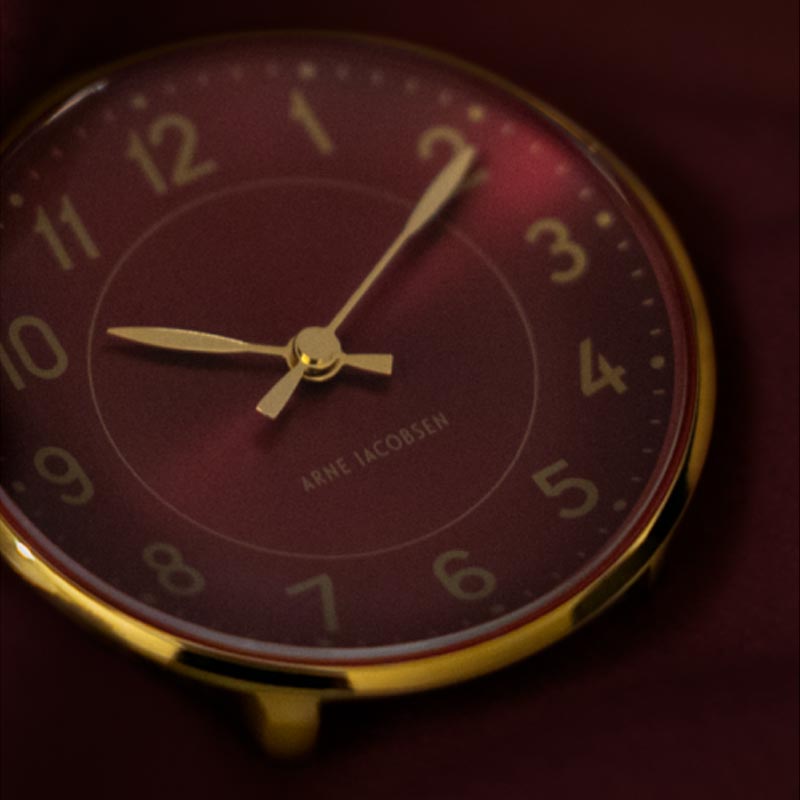 Station Watch, des. Arne Jacobsen - 34mm diameter, burgundy dial / burgundy strap