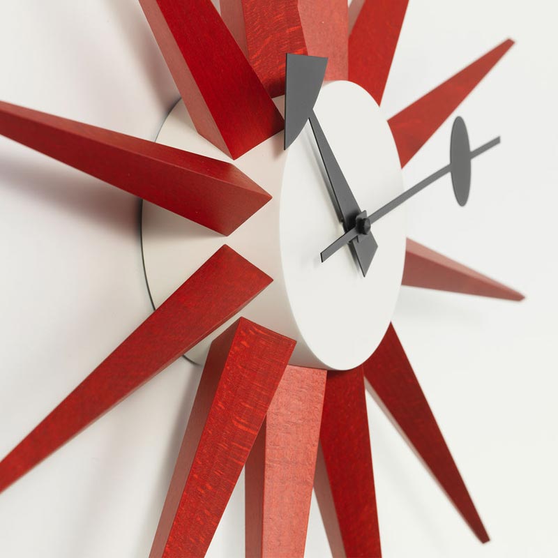 Sunburst wall clock (red) des. George Nelson, 1949 - 1960 (made by Vitra)