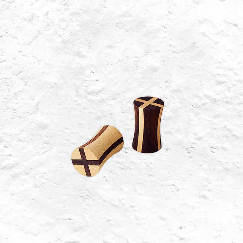 Tip spinning top by Naef Spiele - a pack of two made in maple and walnut