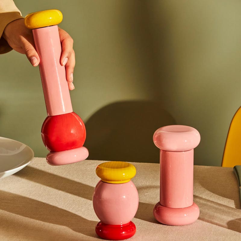 Twergi grinder - pink, red and yellow - des. Ettore Sottsass for Alessi, 1989 (2021 reissue)