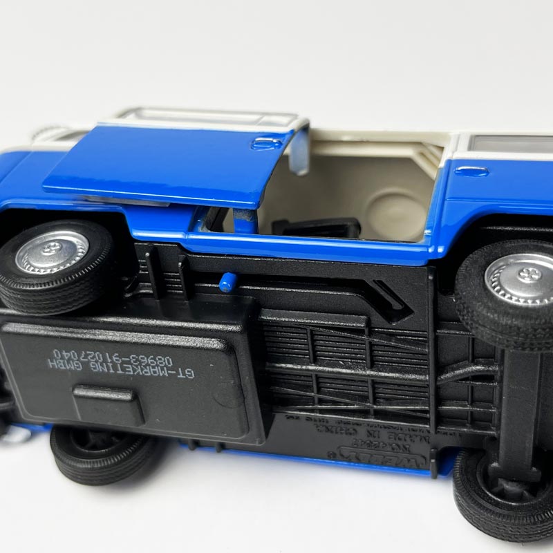 VW Bus Model Car in blue/red/orange