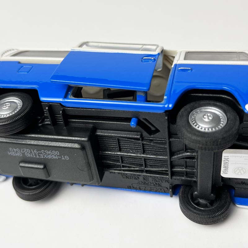 VW Bus Model Car in blue/red/orange
