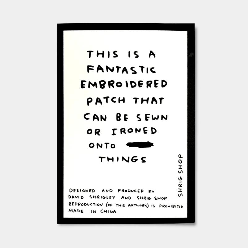 Kiss My Paw - fabric patch by David Shrigley