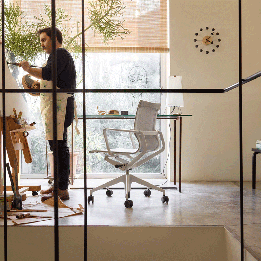 Ball wall clock (brass and black) des. George Nelson, 1948 - 1960 (made by Vitra)