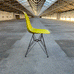 DSR Plastic Side Chair des. C&R Eames, 1950 - mustard shell / black legs (made by Vitra)