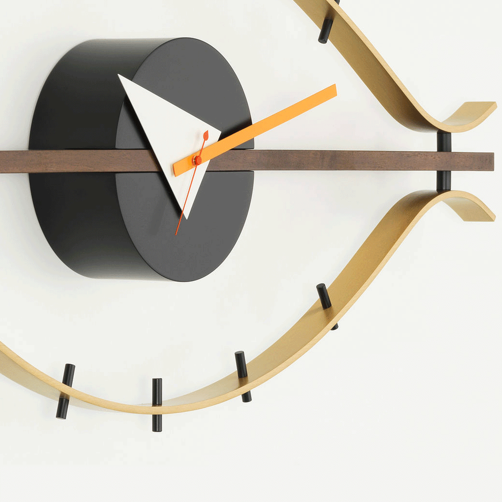 Eye Clock - brass / walnut - des. George Nelson, 1948-60 (made by Vitra)