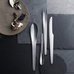 Cutlery Set des. Arne Jacobsen, 1957 for Georg Jensen - 24 pieces (6x knives, forks, small & large spoons)