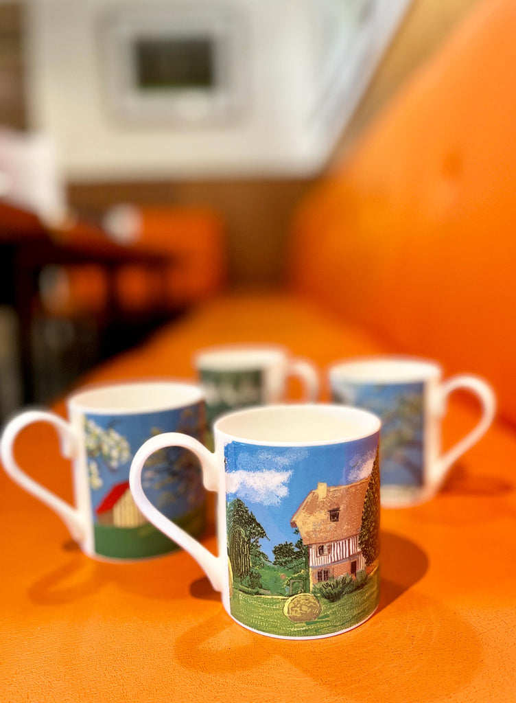 A Year in Normandie Mug by David Hockney (Two Houses and Hay Bales)