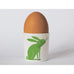 Happiness Egg Cup with Green Rabbit illustration - Bone China made in Stoke-on-Trent by Repeat Repeat