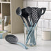 Optima stirring spoon with hole - Nordic Green - by Rosti