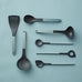 Optima stirring spoon with hole - Nordic Green - by Rosti