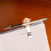 Pen Pup - 2 in 1 Book Clip and Pen Holder, des. Lin Chen for Kikkerland