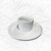 Porcelain floral egg cup and saucer by Rader