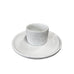 Porcelain floral egg cup and saucer by Rader