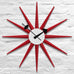 Sunburst wall clock (red) des. George Nelson, 1949 - 1960 (made by Vitra)