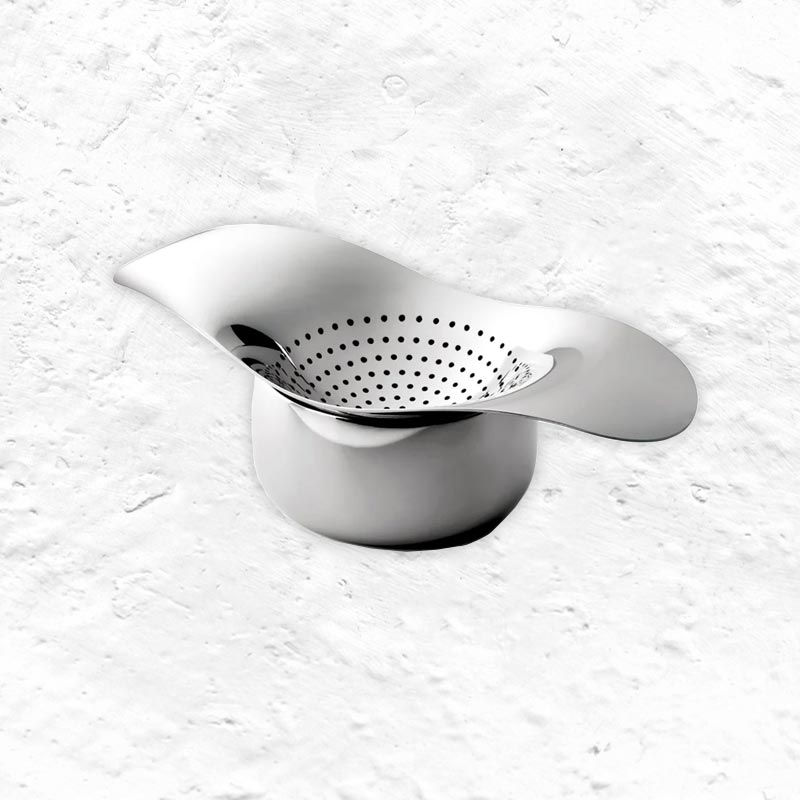 Drift tea strainer & bowl by Robert Welch