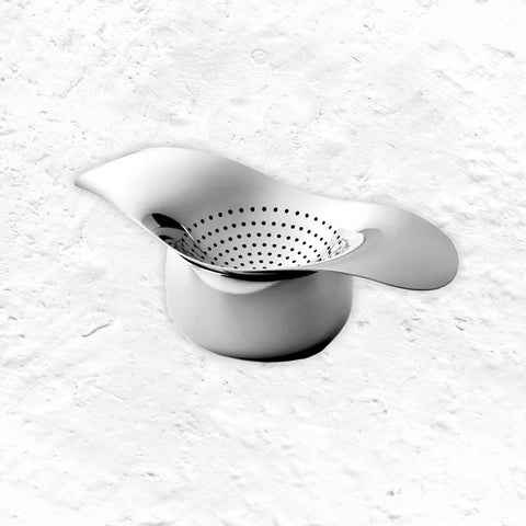 Drift tea strainer & bowl by Robert Welch