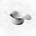 Drift tea strainer & bowl by Robert Welch