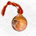 Warm Cinnamon Bauble, by Ashleigh Weller
