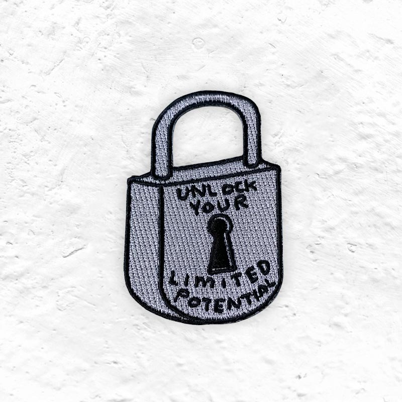 Unlock Your Limited Potential - fabric patch by David Shrigley