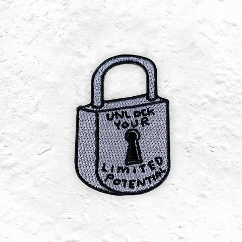 Unlock Your Limited Potential - fabric patch by David Shrigley