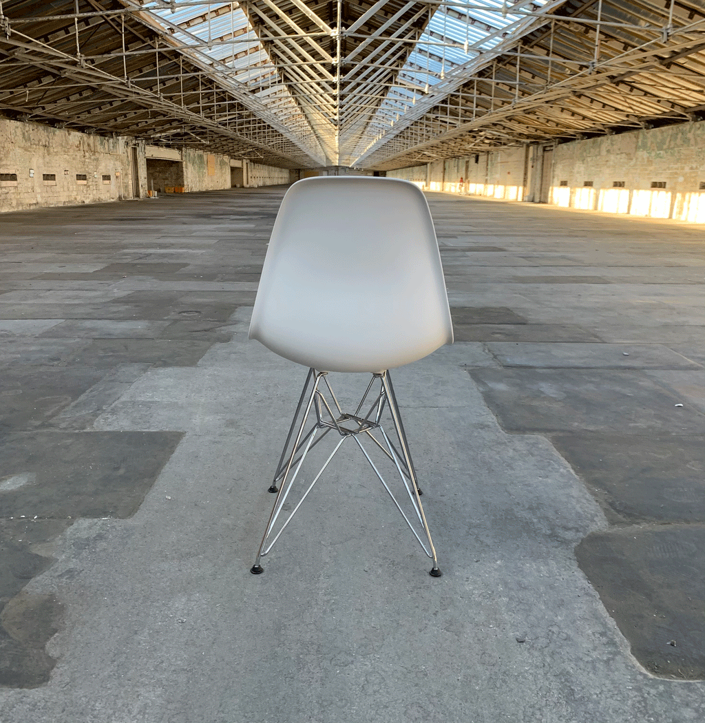 DSR Plastic Side Chair des. C R Eames 1950 white shell chrome