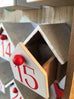 Small wooden advent calendar with tiny drawers