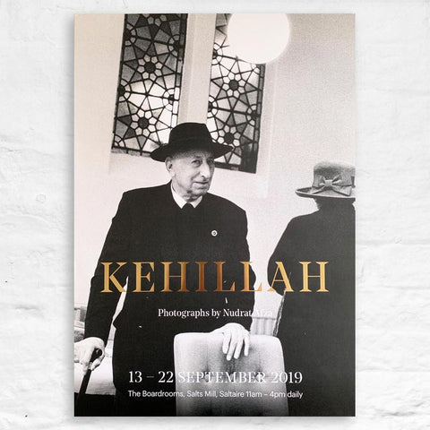 Kehillah Poster by Nudrat Afza (two hats)